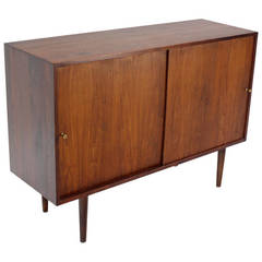 Mid-Century Modern Solid Walnut Credenza with Sliding Doors by McCobb