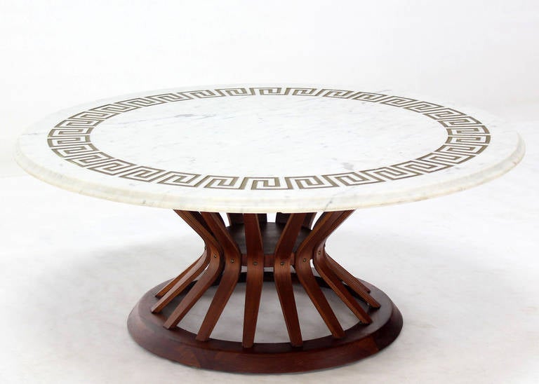 Mid Century Modern oiled walnut base coffee table in style of Ed Wormley for Dunbar. Greek key pattern round marble top. 