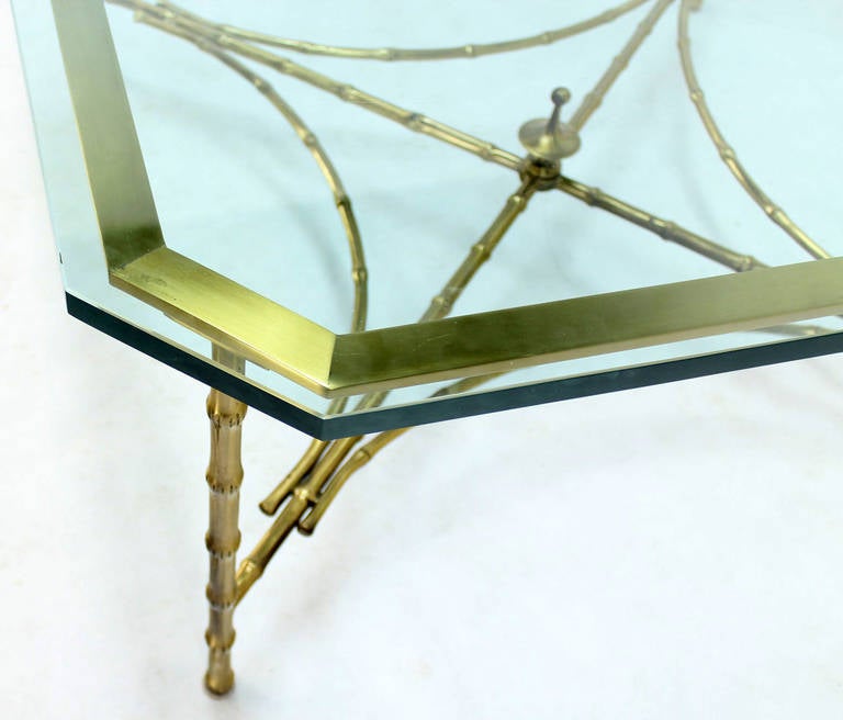 Very nice design Faux bamboo brass base coffee table (3/4" thick)








In style of Maison Bagues