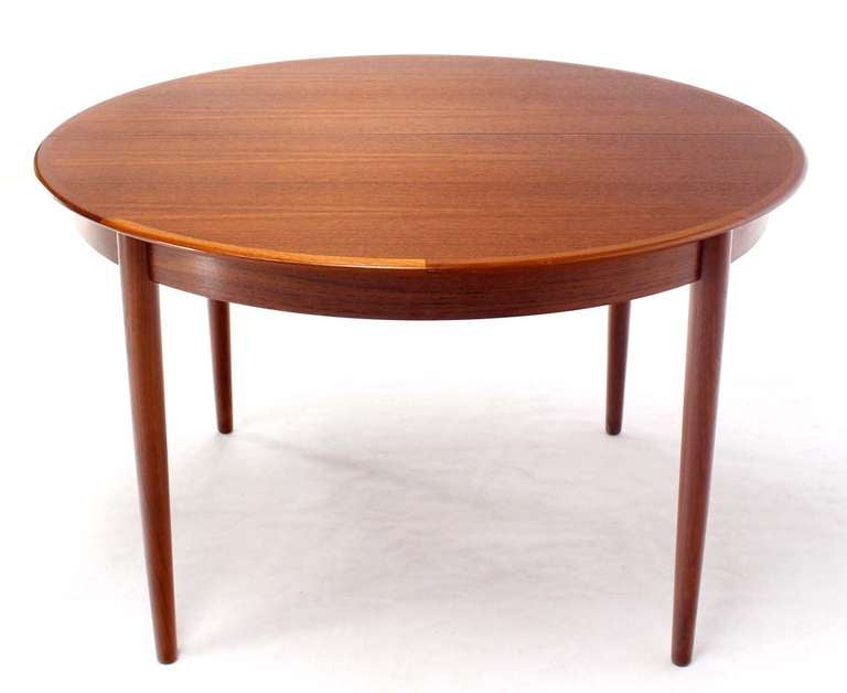 Danish Mid-Century Modern Round Teak Dining Table with Three Leaves 1