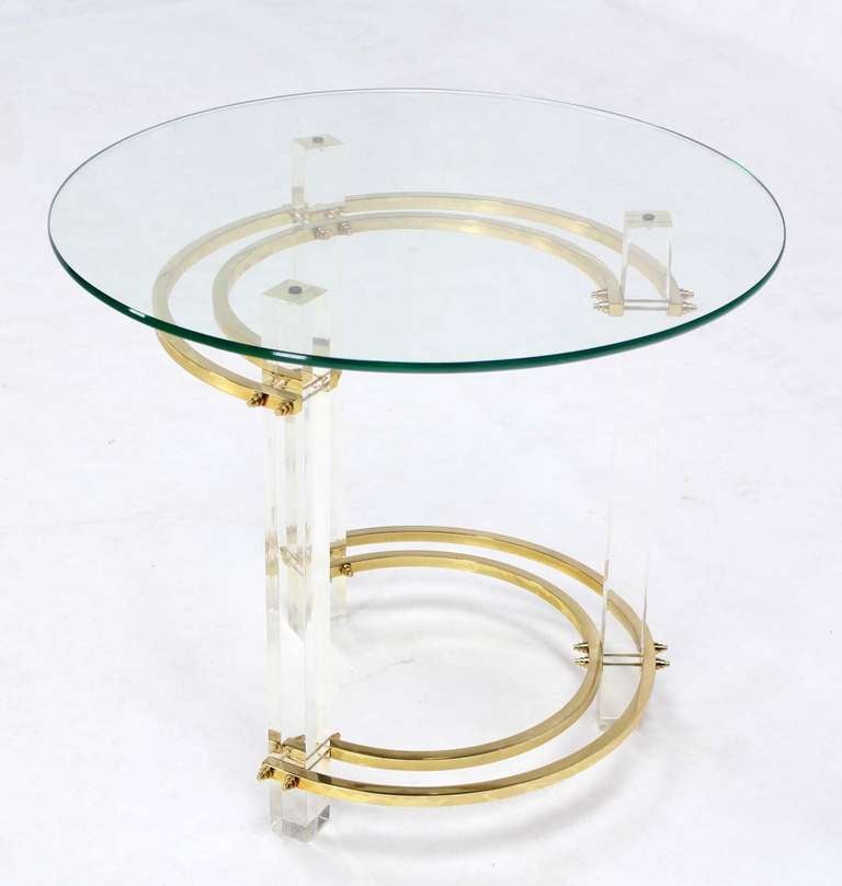 Very nice mid century modern lucite and brass base end table with glass top.