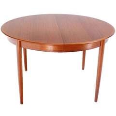 Danish Mid-Century Modern Round Teak Dining Table with Three Leaves 11