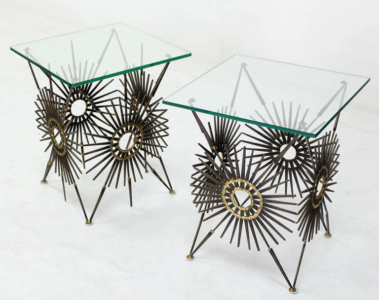 Pair of nice end tables made of spikes braised together to form beautiful sunburst bases.