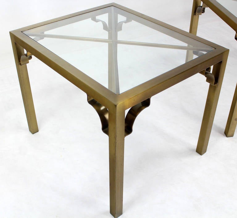 Pair of Mid-Century Modern Cross Brass Base and Glass-Top Side or End Tables 1