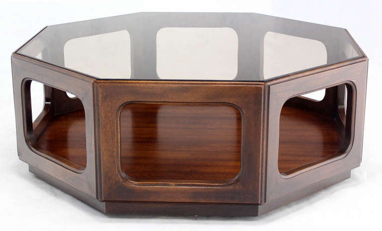 Very nice mid century modern walnut and smoked glass coffee table.