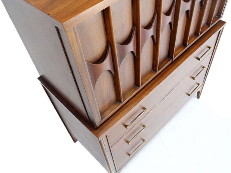 Mid century modern walnut chest with rosewood pulls.