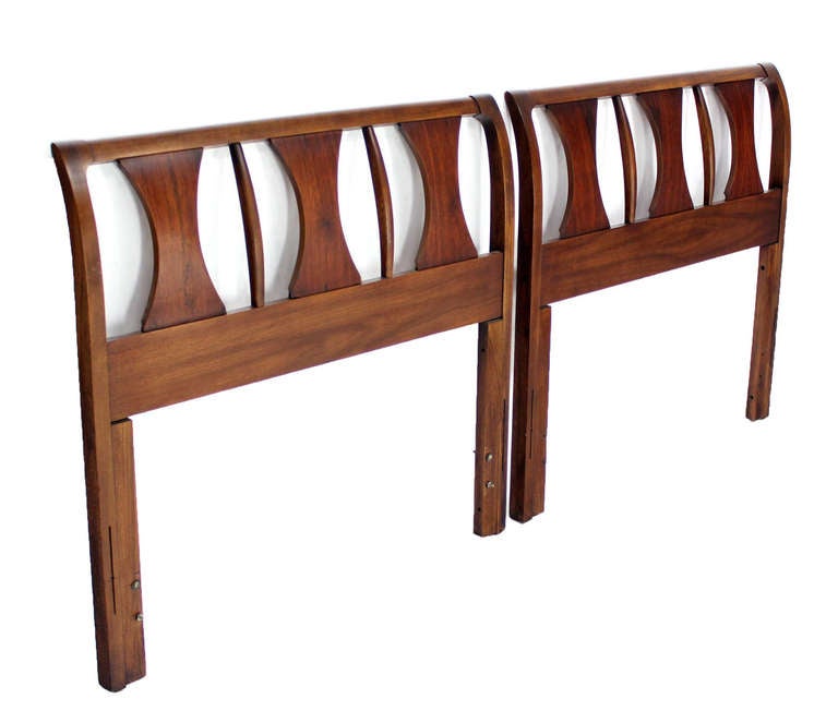 Pair of very nice mid century modern walnut and rosewood headboards.