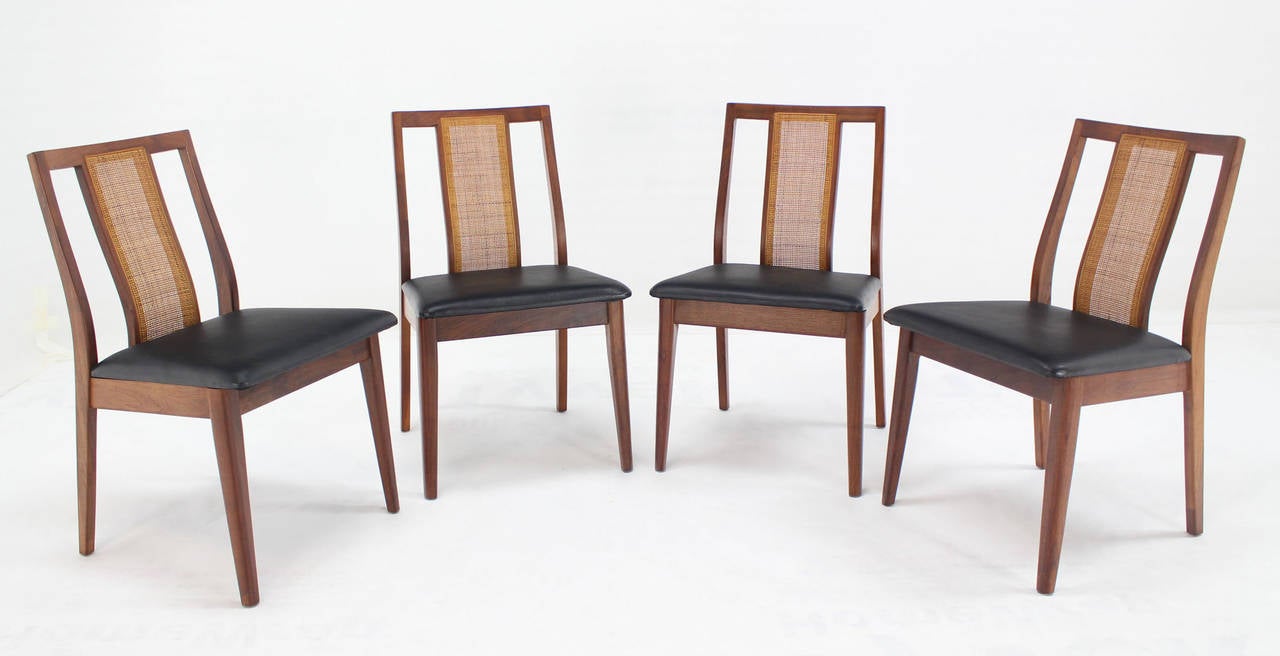 Set of 4 solid and steady Danish mid-century modern oiled walnut side chairs in style of Risom.