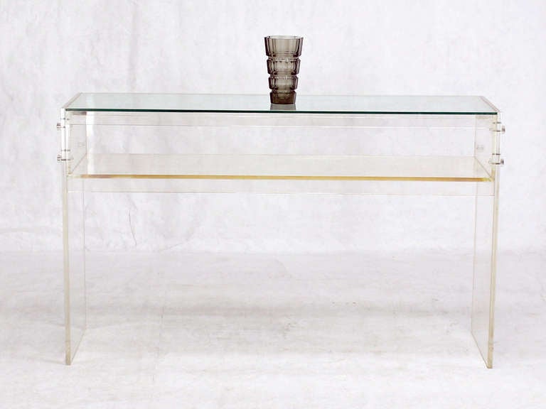 Nice vintage lucite showcase display console table.