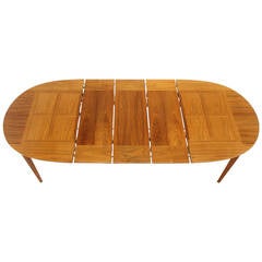 Mid-Century Modern Walnut Oval Dining Table with Three Leaves