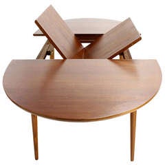 Danish Mid Century Modern Oval Teak Dining Table with One Pop Up Leaf