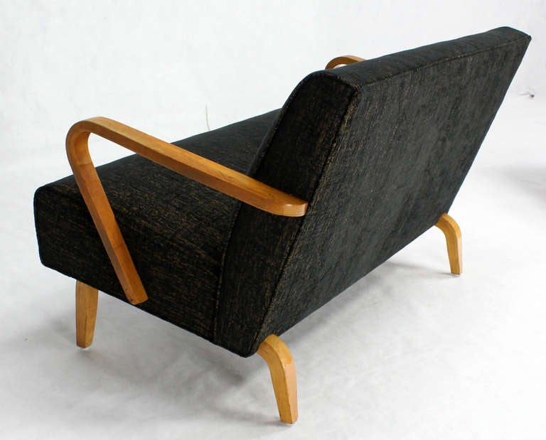 Pair of bent plywood design circa 1950's love seats newly upholstered in Kravets fabric.