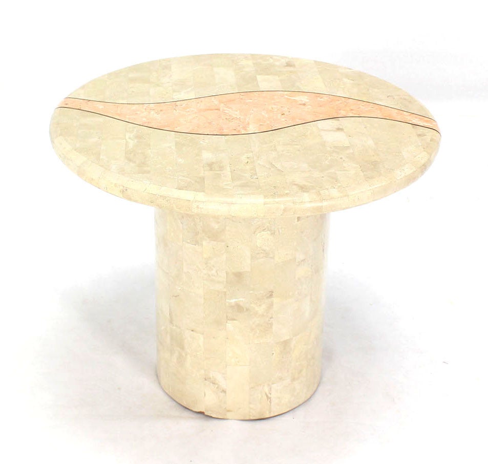 21 inches high tessellated stone veneer center end table with brass inlay. Nice drum shape base.
