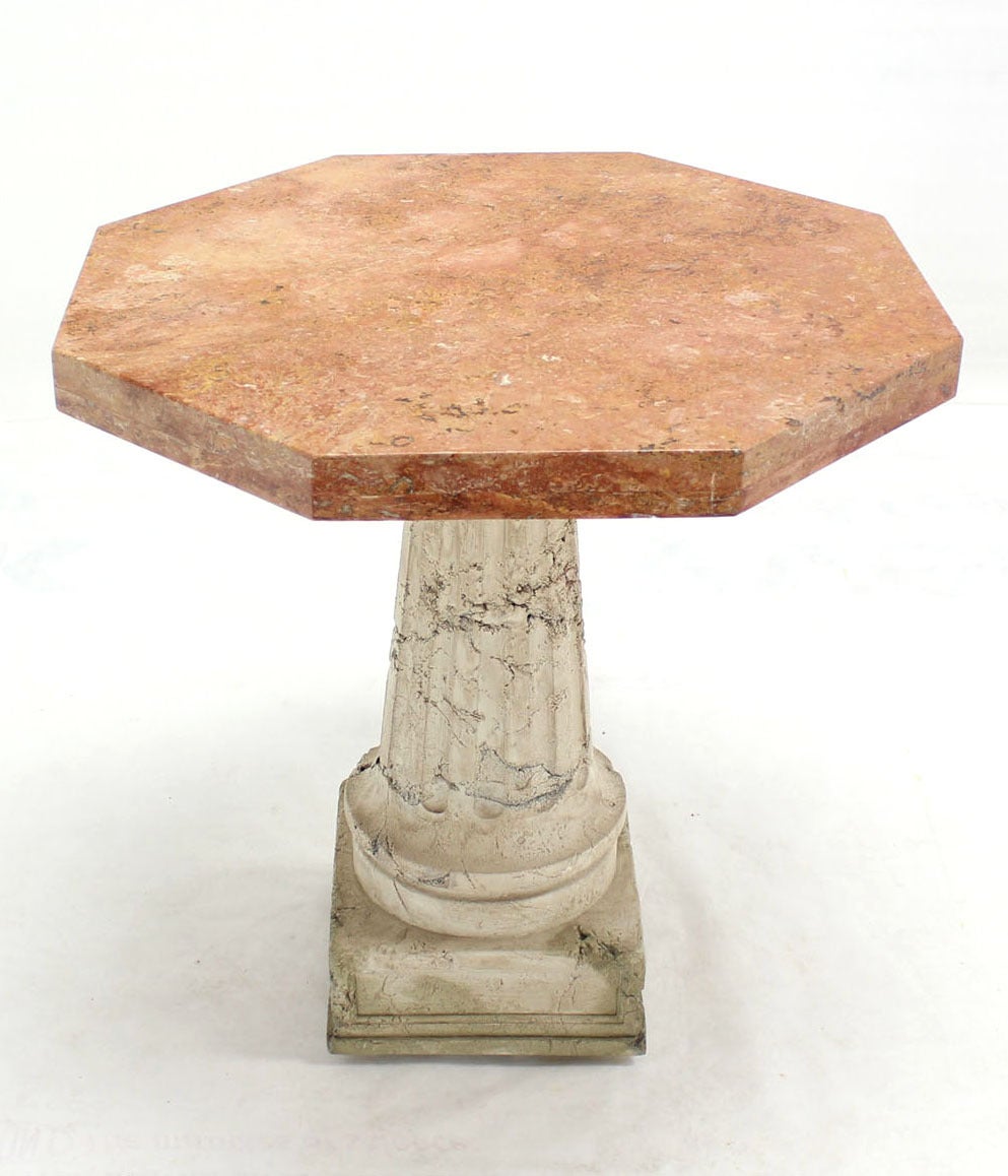 Concrete base thick marble-top center table.