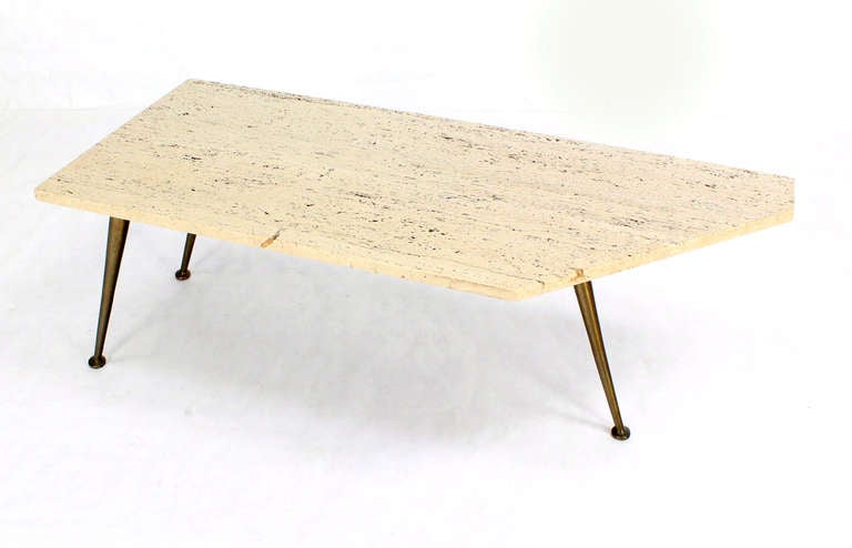 Unusual shape Robsjohn Gibbings travertine top coffee table.