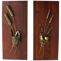 Non-Matching Pair of Cast Metal Sculptures on Solid Walnut Mount Board