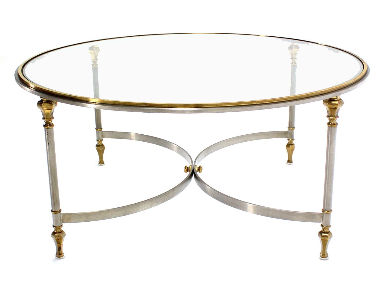 Very nice brass Chrome and glass round coffee table. Excellent vintage condition.