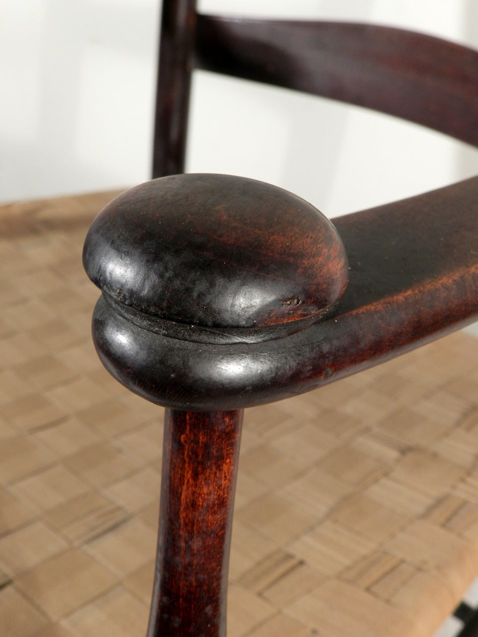 This rocker chair is signed and stamped Shaker, Mt. Lebanon, New York, number 6. The finish and seat webbing are all original. The clean, light construction of this rocker has a very contemporary feel to it. It's timeless and a design Classic. The