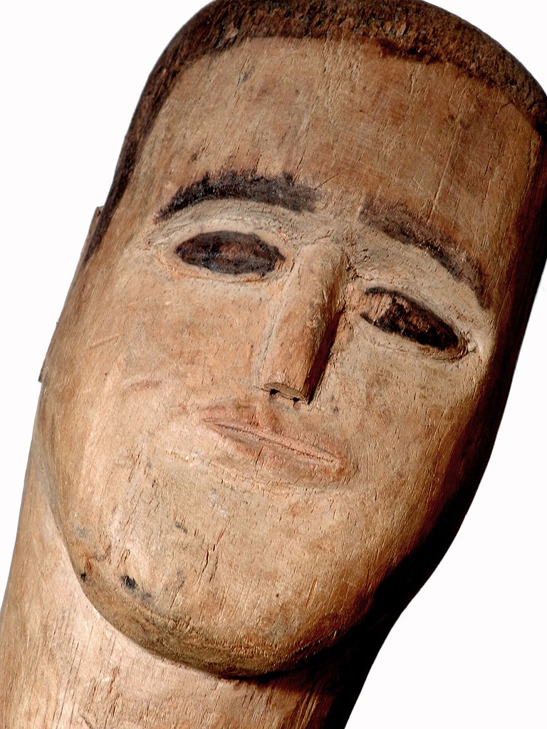 This doll has a face only a mother could love. The disproportions are almost comical and can fall into the catogray of Outsider Art.  I'm not sure what type of display this home-made automated doll was used for and guessing it was some type of