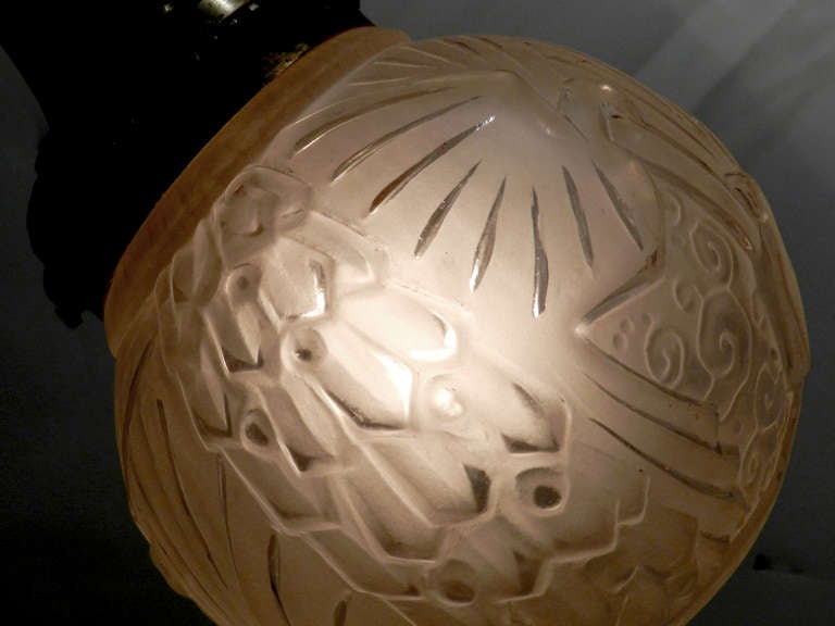 Muller Freres, French for Muller Brothers, made cameo and other glass from about 1895 to 1933. The Muller brothers worked for Galle before they established their glassworks at Luneville. This lamp is signed and all original. We rewired everything to