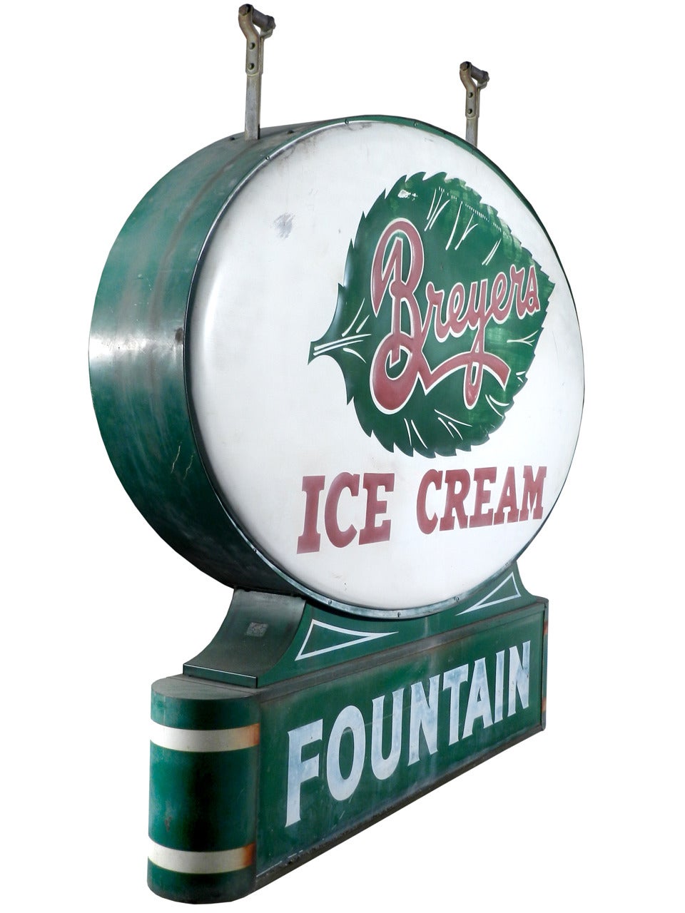 This is a die-cut and embossed sign for a Breyers ice cream fountain. Beautiful artwork and detail went into making this sign from the leaf to the base this sign is one of the more difficult porcelain signs to find. The tin sign is 5 foot wide and