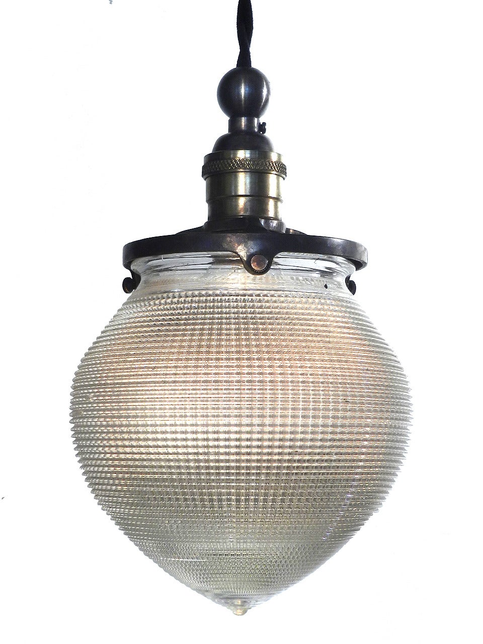We have a nice collection of these rare lamps. This acorn shaped shades are a favorite with collectors because they were mainly used as lighting in dental offices and are difficult to find. The shape is very pleasing makes a perfect simple pendant.