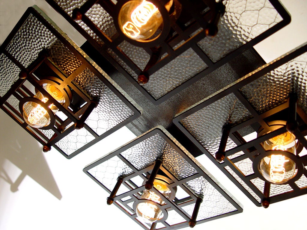 Skeletal 4 Light Industrial Wire Glass Chandelier
