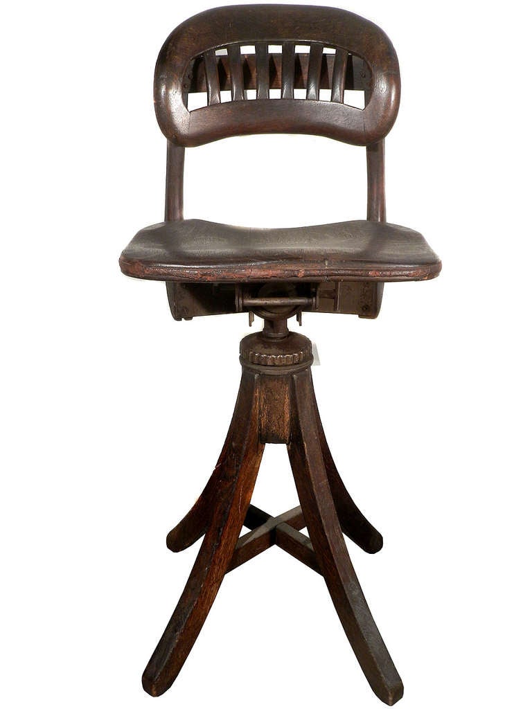 We love Industrial furniture but sometimes it can be a bit cold. This beautiful Architects dark oak drawing board chair is a nice change. It's industrial and a bit Arts And crafts at the same time. Total hight is 40 inches and the seat is 20 inches.