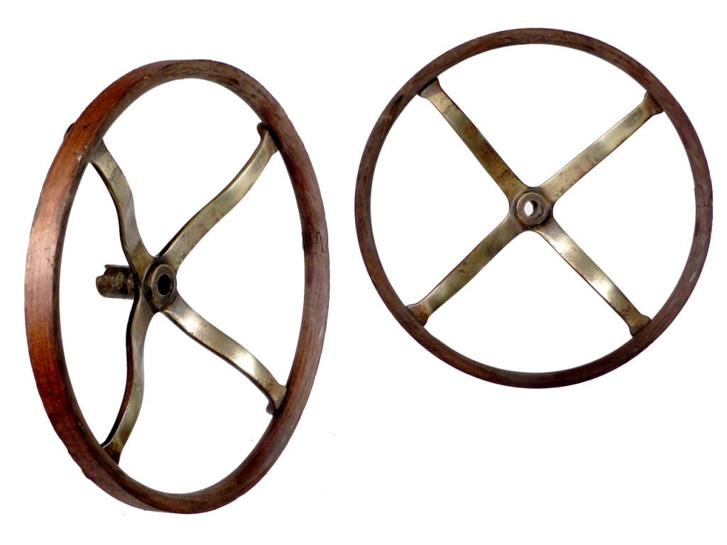 Collection of 4 Early Automobile Steering Wheels