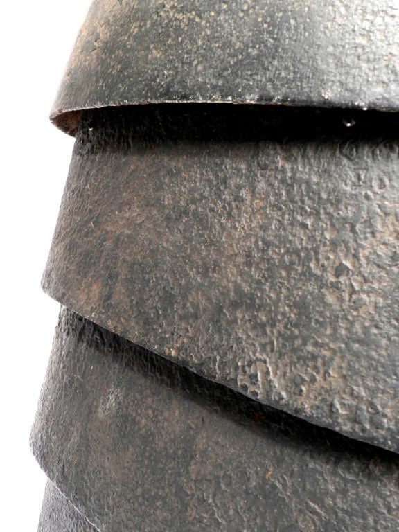 This rare and heavy WW1 trench armor makes a striking display. These were not manufactured in large numbers and are very hard to find outside of a museum. It's professionally mounted on a hand-made museum quality stand. I've pictured the back of the