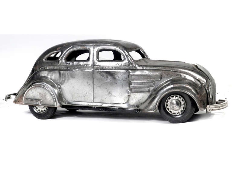 COR-COR CHRYSLER AIRFLOW Cor Cor, pressed steel, well designed toy model. The car shows some surface rust on the steel finish and wear. It's a solid toy that displays well and is an impressive 16.5 inches.
For questions or net pricing please