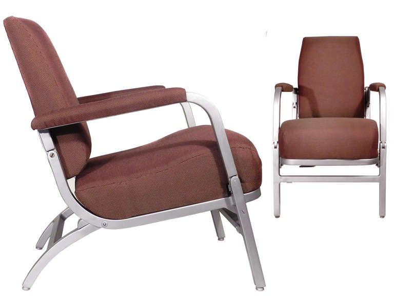 These folding lounge chairs are as rare as they get. It was high style for luxury transportation. When have you ever seen a thickly padded and upholstered folding lounge. These chairs were used on midcentury streamlined luxury Pullman cars. They