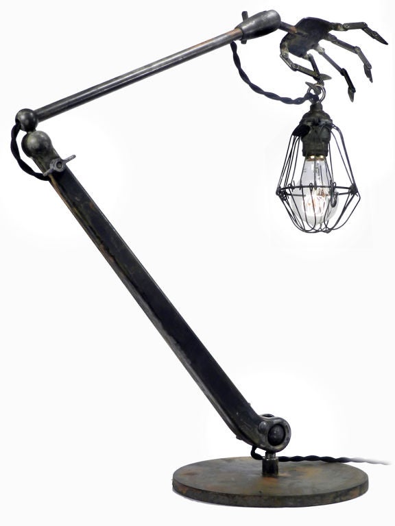 These amazing desk lamps will become the focal point of any room it's placed in. It's a bit Steampunk, Adams Family and Nightmare Before Xmas rolled into one. All the joints including 4 on each brass finger are articulated and can be posed any way