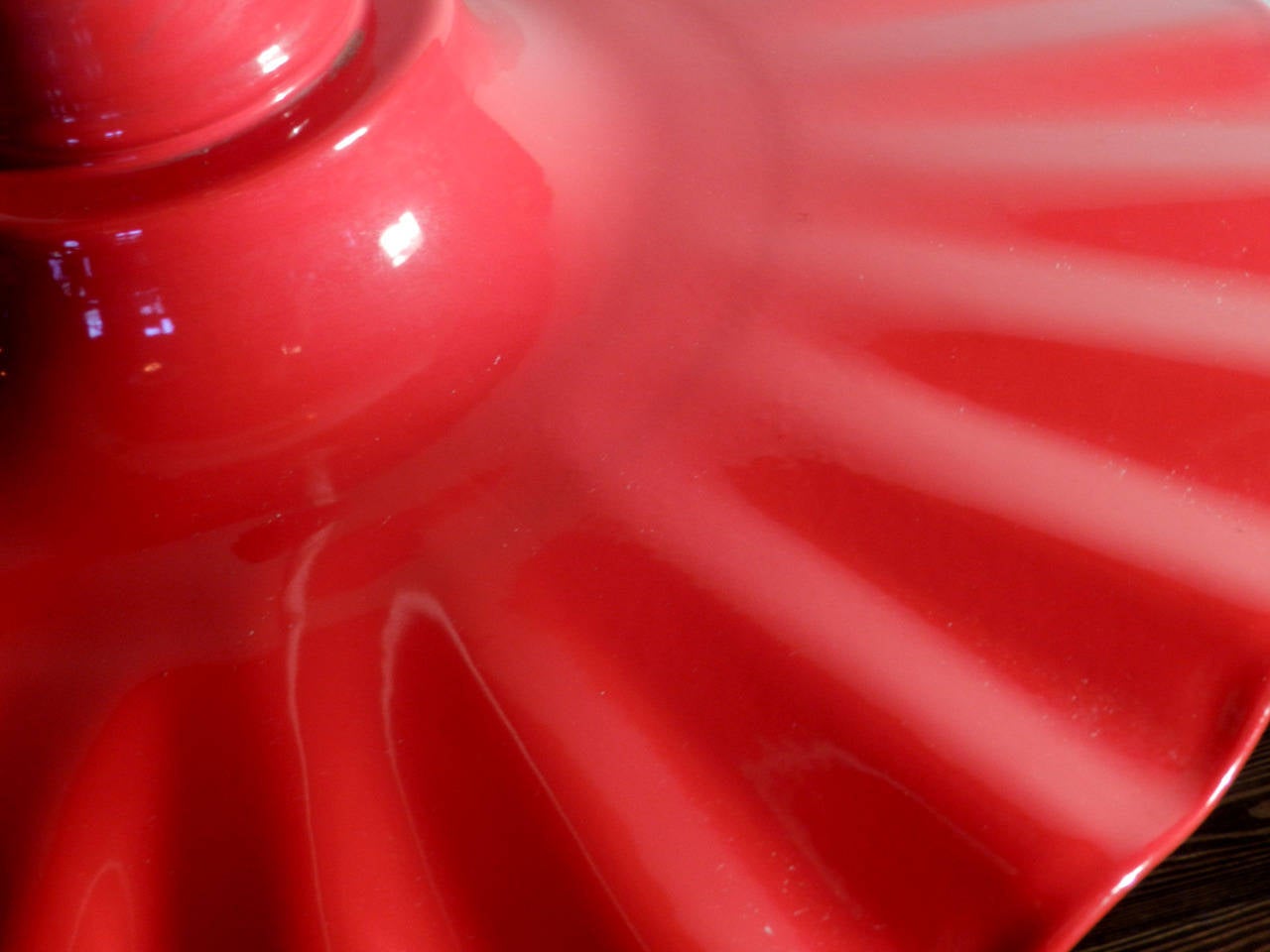 These large 20 inch diameter red over white showy porcelain fixtures are in very nice condition. We have a handful of matching examples. You don't see this color often.