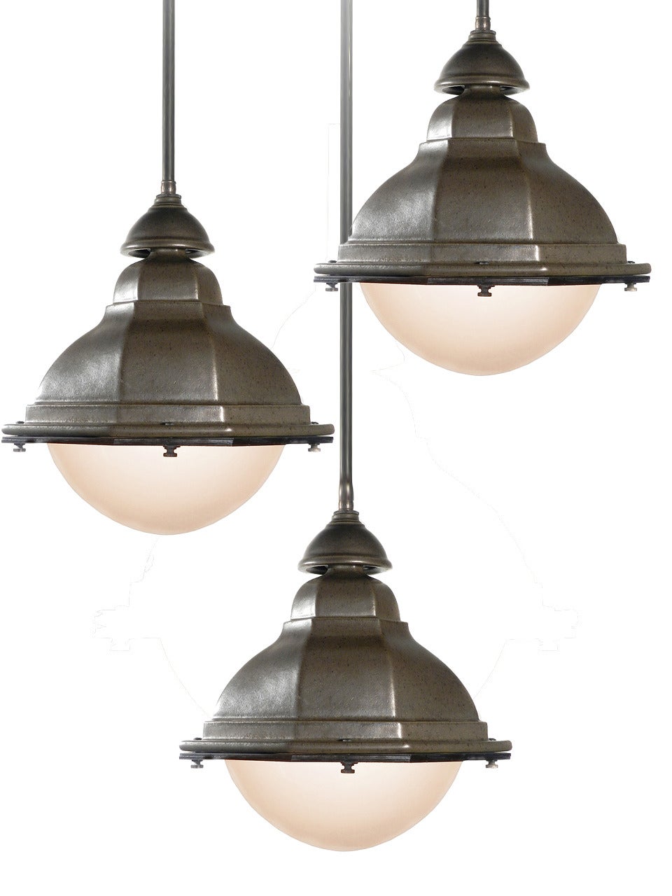 This is a beautifully glazed heavy terracotta lamps was inspired by turn-of-the-century cast iron French street lights. The finish is kiln fired producing a subtle patina in a dark matte green gray. It has the feel and finish of Teco pottery. It has