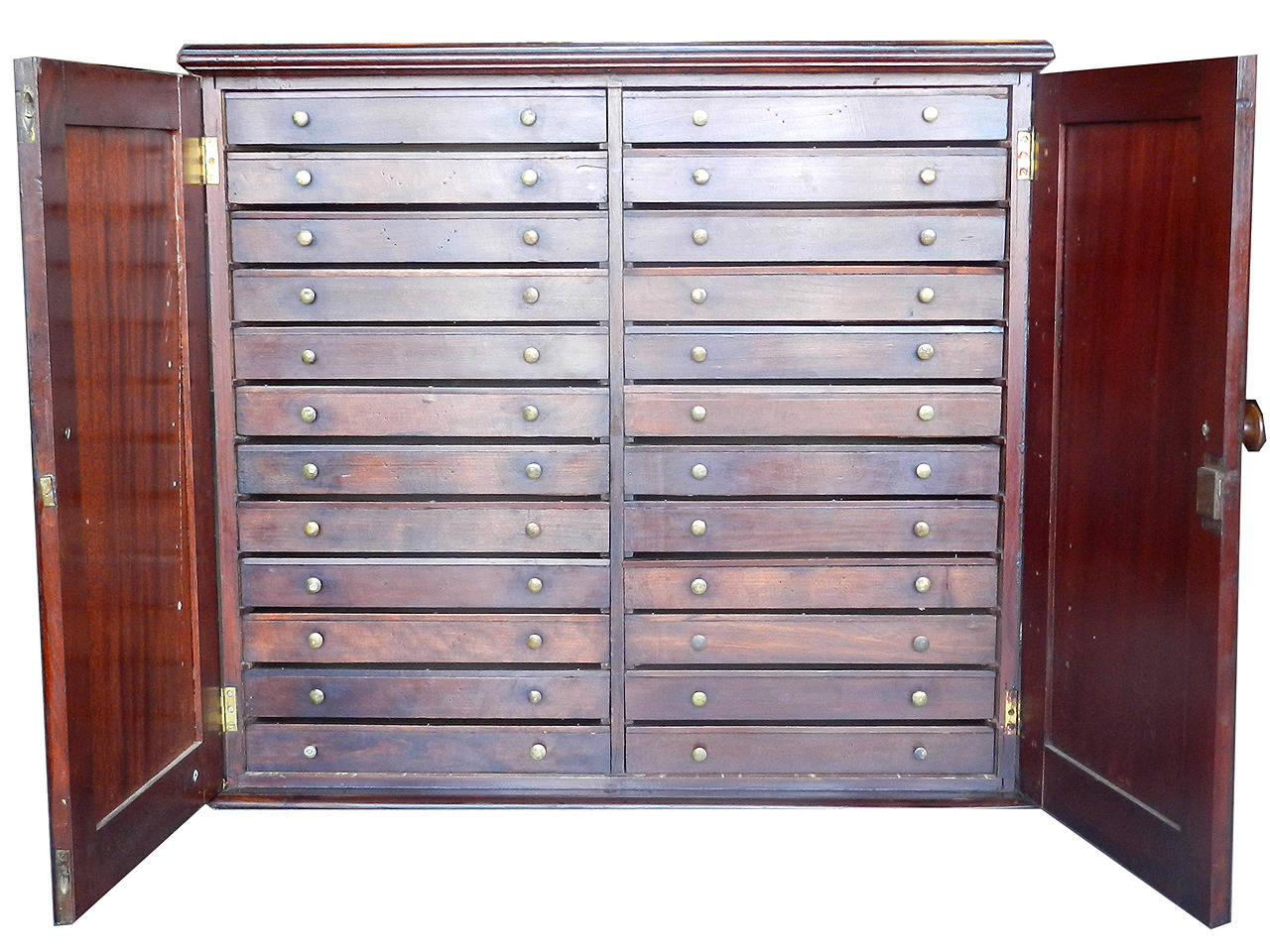 This is a wonderful 24 draw museum style specimen cabinet. Each draw is a shadow box with a removable glass top to protect your collections. I think the wood is mahogany and the finish is nice and original. It's a good size and not too big to sit on