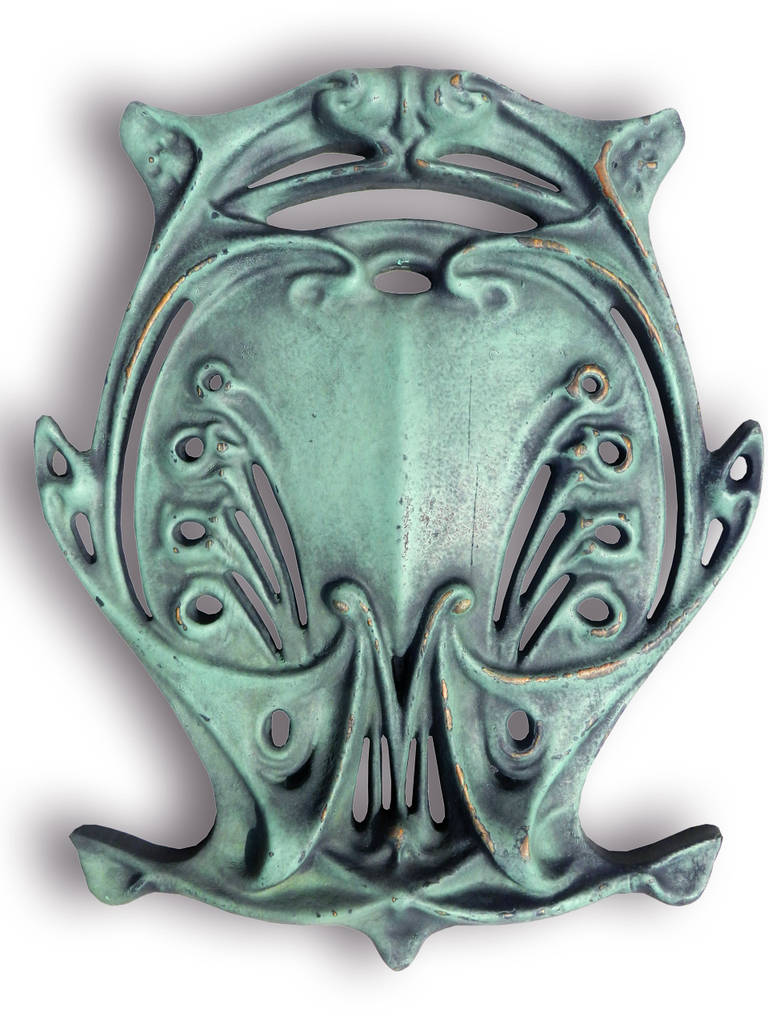 Hector Guimard was an architect, who is now the best-known representative of the French Art Nouveau style of the late nineteenth and early twentieth centuries. The Metro shield pictured above was not carved by Guimard and is a replica of his