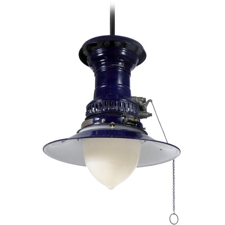 You just don't find matching pairs like this. Cobalt Blue porcelain in matching condition with matching milk glass shades. They were electrified but have kept all the gas elements that make this type of lamp charming. You can still see the original