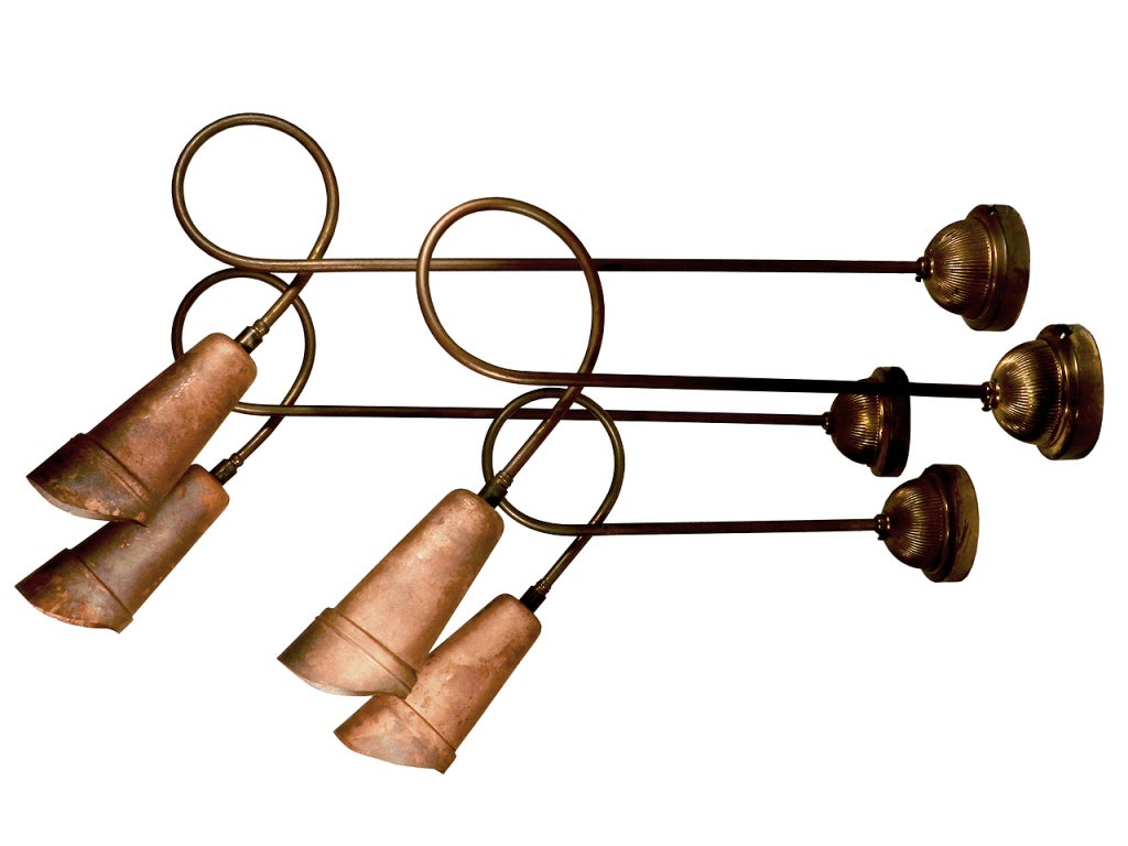 We have 4 matching lamps in this collection. There are 2 that reach out about 30 inches and two that are 20 inches long. They can be installed as a group or individually. They also look equally good on the ceiling or wall. The look is very light and