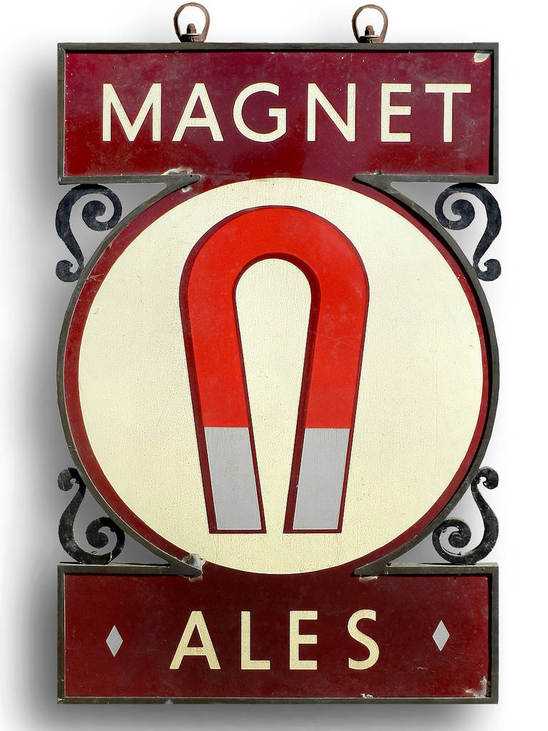 The magnet trademark was first registered in September 1908 in Brussels, and symbolized strength. This large porcelain double-sided sign is framed in iron. It's a striking sign with big bold graphics and I'm guessing its early 1900s.