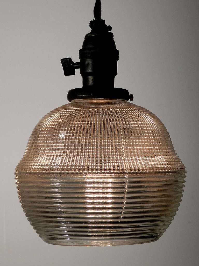 Art Deco Pair of Unique Holophane Globe Pendents.