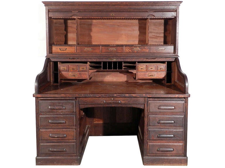 We have all seen large roll top desks but I have never come across one as impressive as this Darby. Engravings in early catalogs picture these but we have never seen a real one. I think the 2nd tier top cabinet was a special custom order. It all