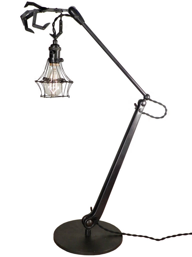 These amazing desk lamps will become the focal point of any room it's placed in. It's a bit Steampunk, Adams family and the nightmare before Xmas rolled into one. All the joints including four on each brass finger are articulated and can be posed