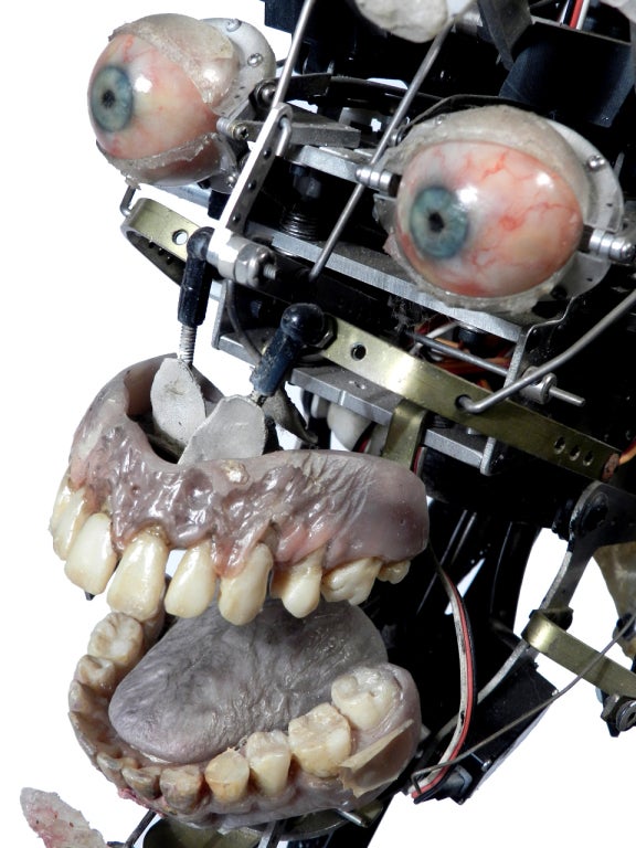 I was told they this was head was used as part of the special effects for the movie Rose Red by Stephen King. But more important for me was the look of this animatronic head. This was the inside workings of a very realistic head. There are 16 servo