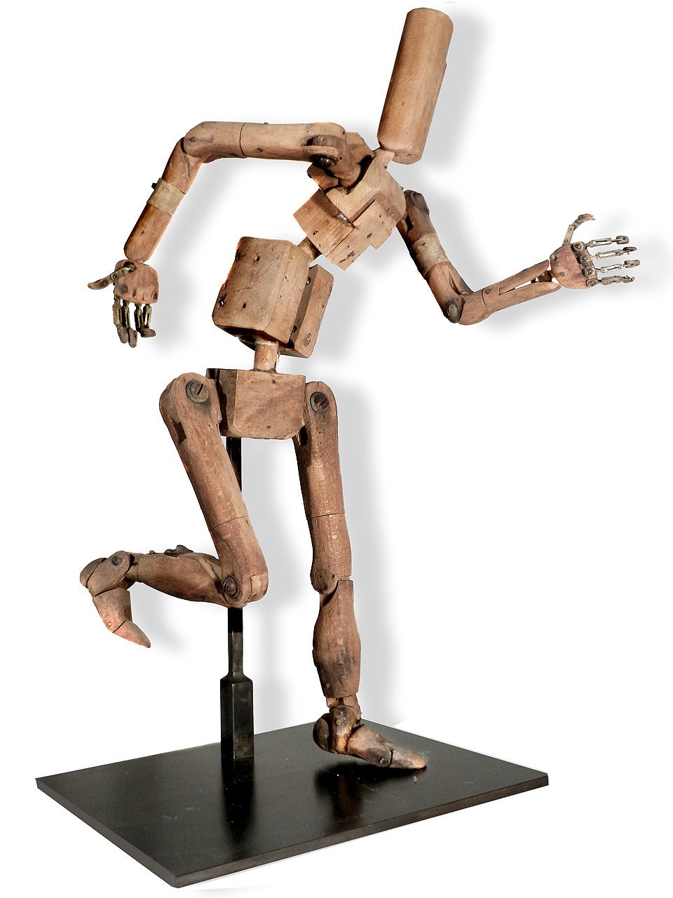 Of all the things I offer these posable schematic artist's mannequins are my favorite. They give any space they are in personality and also have a machine like quality. This one is complete with brass and wood ball joints, articulated hands and