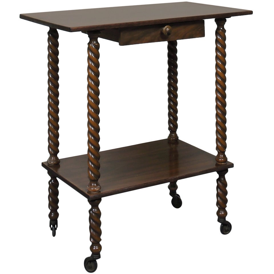 An Italian Side Table on Casters