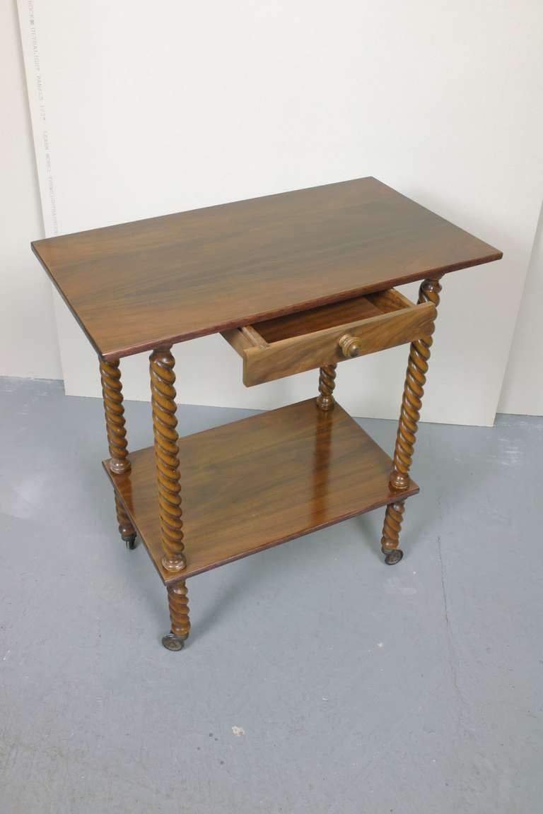 An Italian Side Table on Casters 1