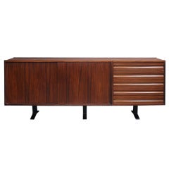 A room dividing modular sideboard by Osvaldo Borsani