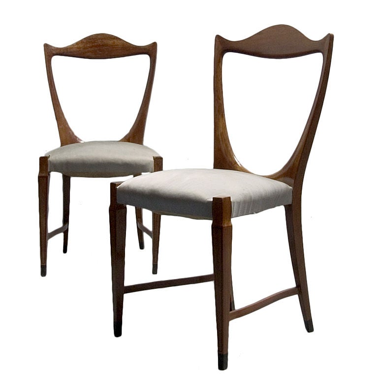 An important pair of mahogany & ebony side chairs by Paolo Buffa