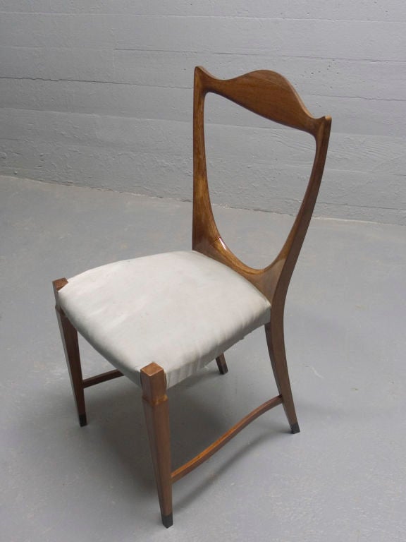 An important pair of mahogany & ebony side chairs by Paolo Buffa 2
